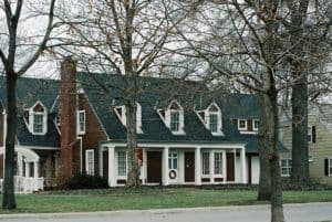 two-story-colonial-composition-roof-gutter-cover-Mission-Kansas